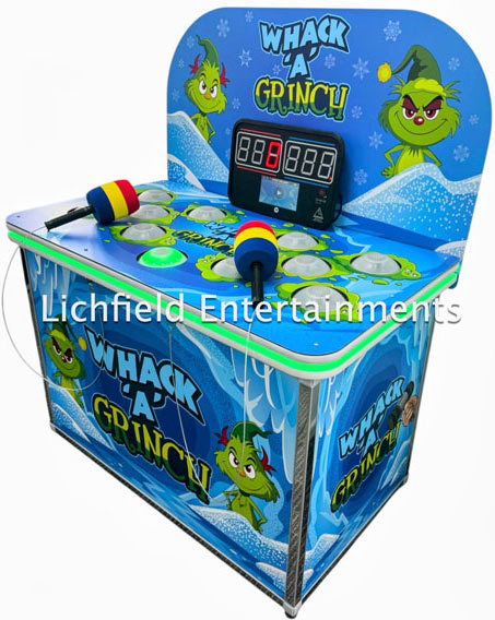 Christmas theme Whack a Grinch arcade game for hire from Lichfield Entertainments